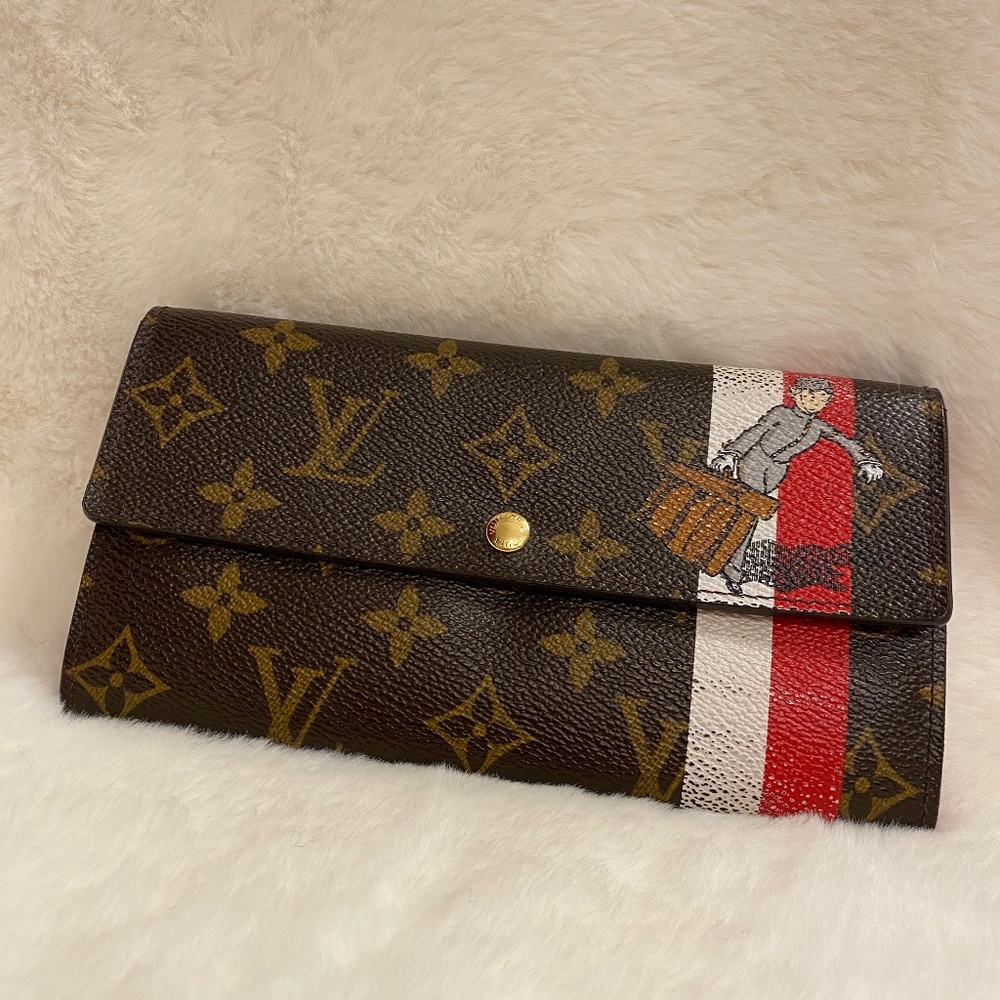 Authentic Louis Vuitton Sarah long wallet with poppy interior